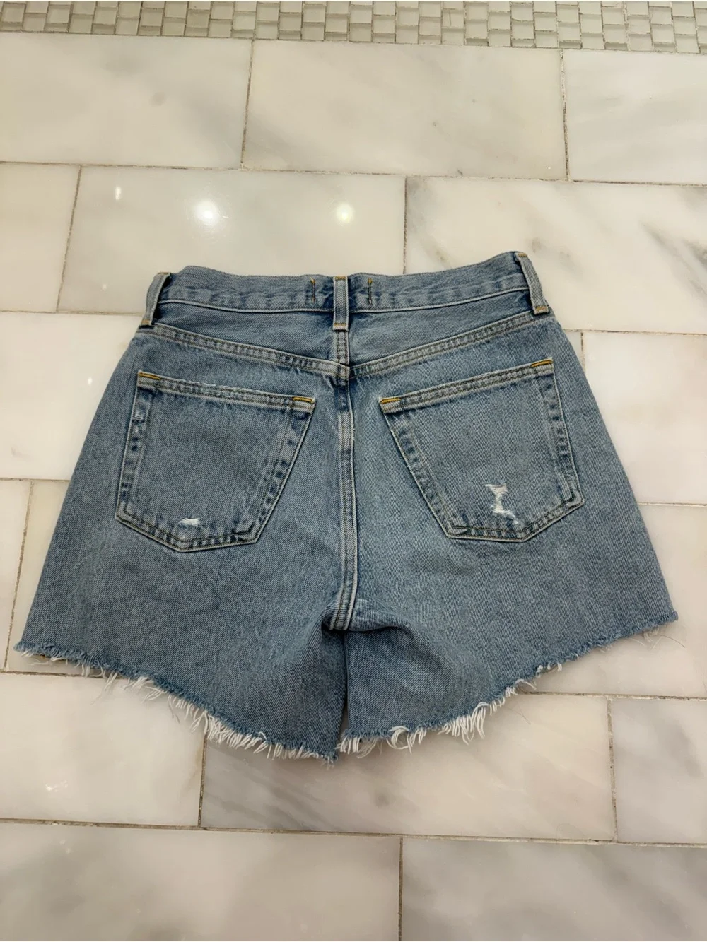 AGolde Parker Long High-Rise Light Wash Denim Shorts